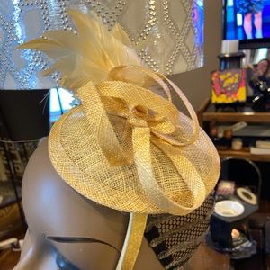 New with box.  Tan fascinator for all occasion
